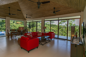 Living room and dining room with bamboo cathedral ceiling