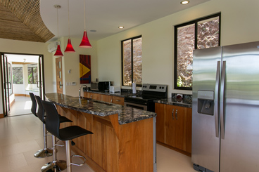 The beautiful kitchen and breakfast bar
